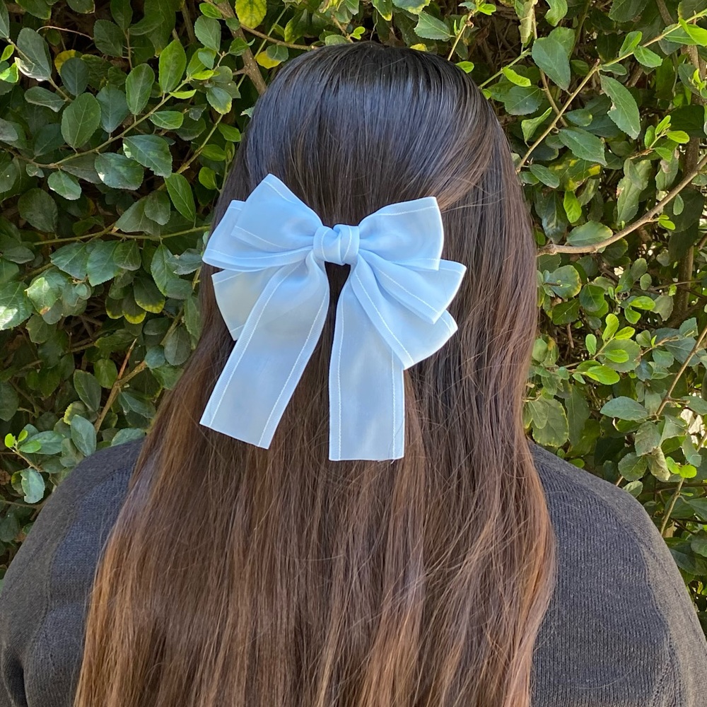 Light blue clip in hair bow